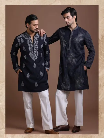 Two distinct styles of embroidered navy kurtas. Whether you prefer bold, traditional patterns or subtle, modern designs, I craft pieces to elevate your traditional wardrobe.