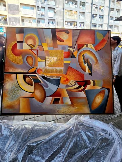 It takes a team to handle a masterpiece of this scale. Here, my assistants carefully carry the finished and framed "The Sounds of Music" painting, ready for delivery to the client.