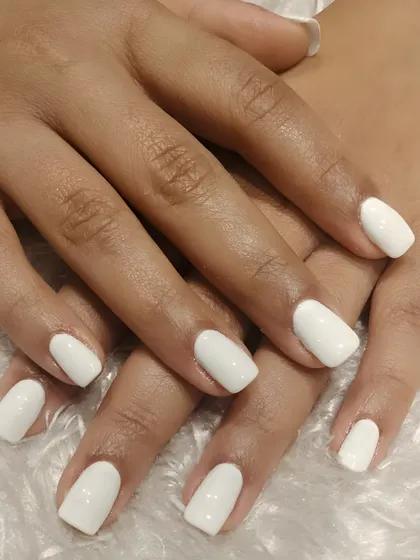 You can never go wrong with a crisp, opaque white manicure. This look is fresh, bold, and perfect for making your nails pop.