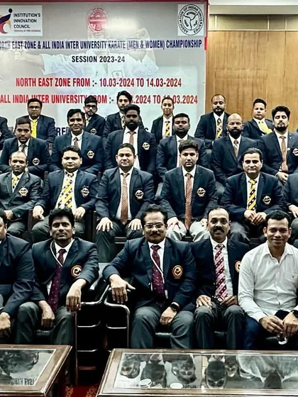 A series of photos showing the dedicated group of officials, judges, and technical committee members from the North East Zone & All India University Karate Championship. It takes a large, coordinated team to run a successful national-level event.