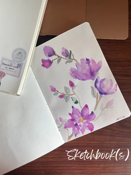 A simple watercolor floral painting in one of my sketchbooks. Sometimes, a single beautiful image is all a page needs.