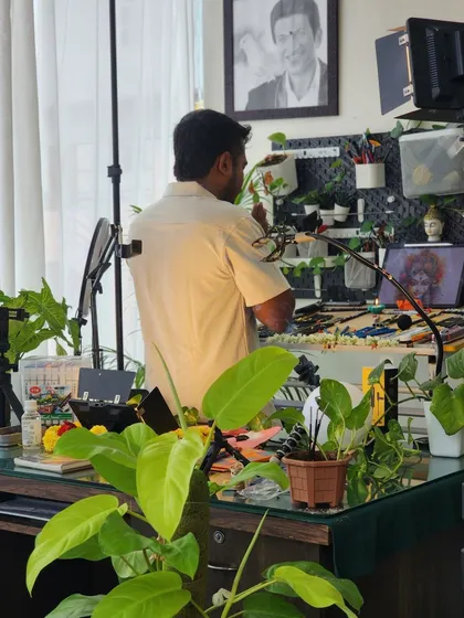 A glimpse into my creative world. Here I am in my studio, the place where I turn your photos and stories into digital art with a lot of heart.