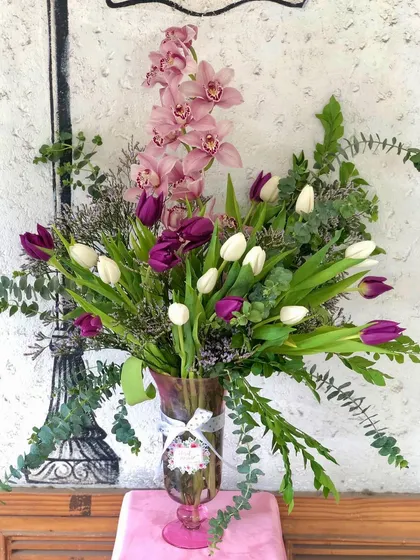 Another angle of this lush arrangement, showing how the different flowers and greenery come together. I focus on creating bouquets that look beautiful from every viewpoint.