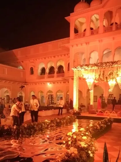 Destination weddings are our specialty. Here is a glimpse of a royal wedding setup at a palace in Rajasthan, illuminated for a grand evening ceremony. We transform magnificent venues into personal, unforgettable experiences.