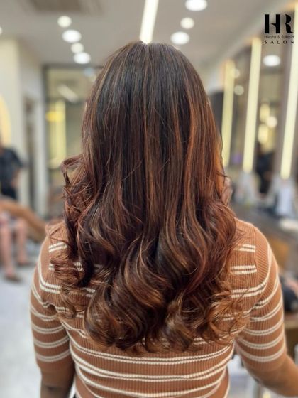 The "after" of the color correction, now with beautifully blended brown and caramel tones for a much more natural and refined look.