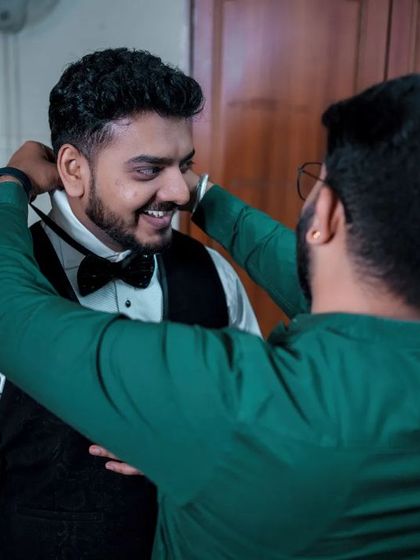 A duplicate of 106, capturing the friendship and support on the wedding day.