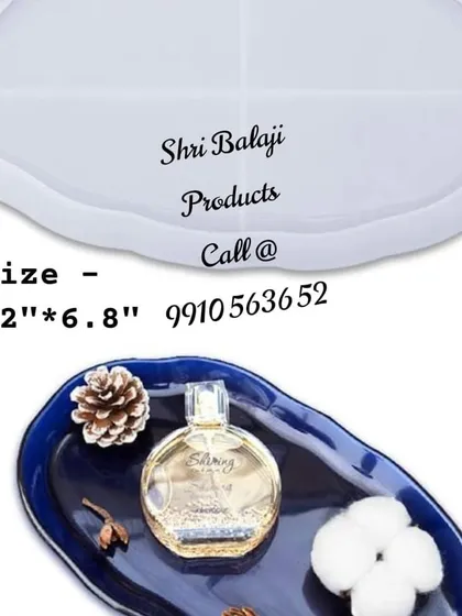A beautiful, organically shaped resin tray created using one of our molds. These trays are perfect for holding perfume, jewelry, or other decorative items.