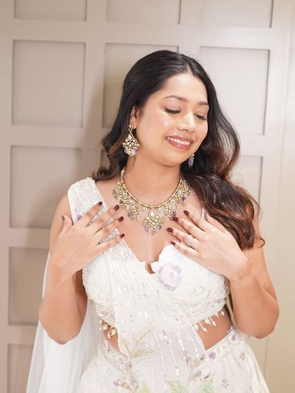 A happy, candid moment. The makeup looks flawless even in motion.