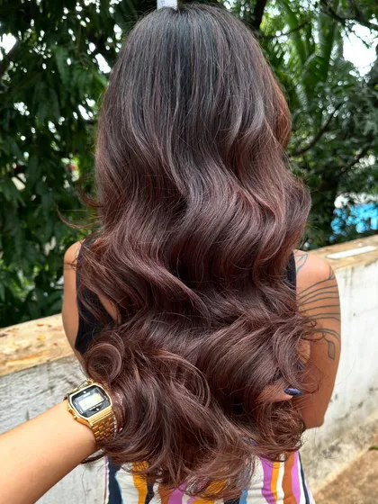 A fresh new look for this client. We did a full color transformation to this rich chocolate brown and finished with a healthy cut and bouncy blowout. The smile at the end says it all.