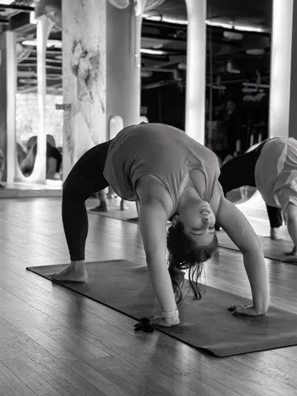 The Wheel Pose (Chakrasana) is a deep backbend that opens the entire front of the body. In my classes, I guide students safely into poses like this to build strength and flexibility.