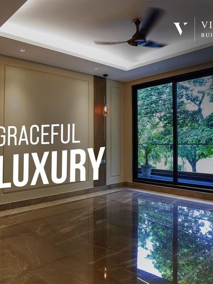 This empty room with its high gloss marble floor, wall molding, and large window showcases the graceful luxury we build into the very foundation of our homes, a perfect canvas for any design style.