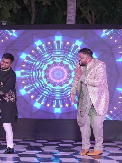 Two friends having a blast during their performance. Their energy and synchronized moves show the fun of dancing with your bestie.