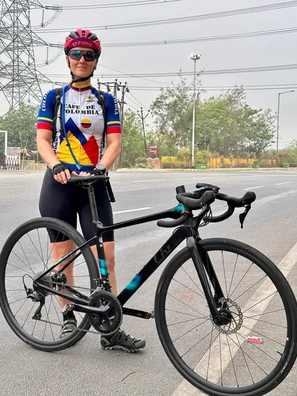 Posing with her Liv bike, a brand dedicated to female cyclists.