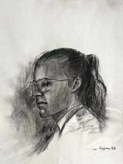 A charcoal sketch focusing on a side profile. This perspective allows for a study of form and silhouette. I paid close attention to the structure of the face and the simple detail of the ponytail.