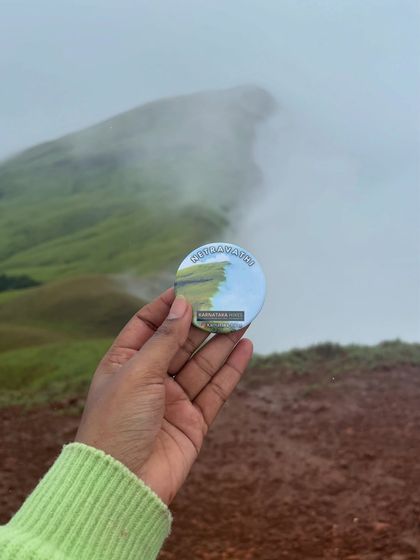 A close-up of our Netravathi badge, a memento of the misty mountain adventure.