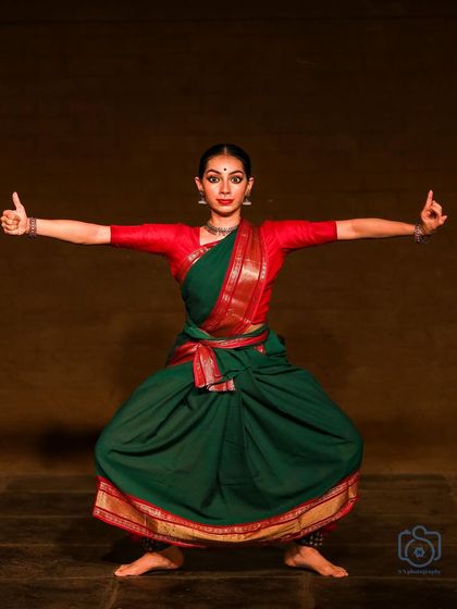 A foundational 'aramandi' or half-seated pose, which is central to Bharatanatyam. It's a position of stability from which all movements flow.