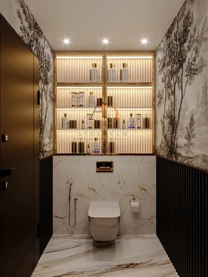 This angle shows the clever use of a backlit, fluted glass cabinet for storage, set against the artistic wallpaper and marble-clad lower wall.