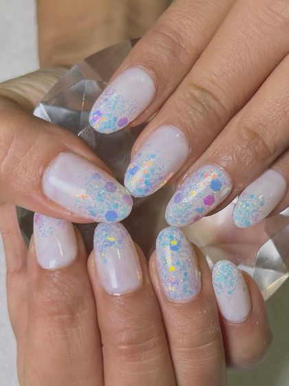 Another look at the inbuilt multi-colored glitter nails, showing the beautiful depth and sparkle created by encapsulating the glitter within the nail.