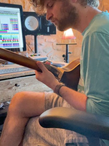 Michael League tracking fretless bass in Spain. The choice of instruments is key to creating the unique fusion sound of the album.