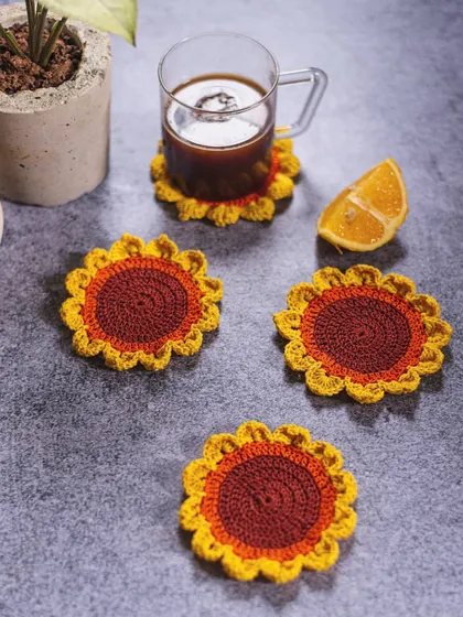 Our cheerful sunflower coasters styled for your daily coffee break. These vibrant, floral-themed coasters are designed to protect your tabletops while adding a splash of handmade happiness to your home.