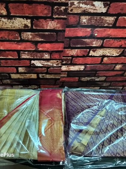 Another view of the packed sarees. This compact folding is perfect for travel, as it takes up very little space in your luggage.