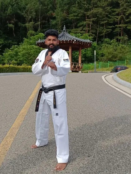 A moment of focus on a road near the Taekwondowon.