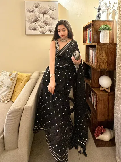 The full look, showing how the saree drapes beautifully. This is a great example of a wedding guest outfit that is both stylish and easy to manage.