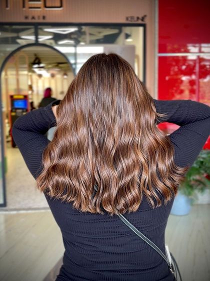 The shine on this brunette balayage is incredible. I always prioritize hair health, so your color looks vibrant, not dull.