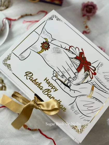 The beautifully illustrated box for my 'Rakhi Delight' hamper, capturing the essence of the sibling bond.