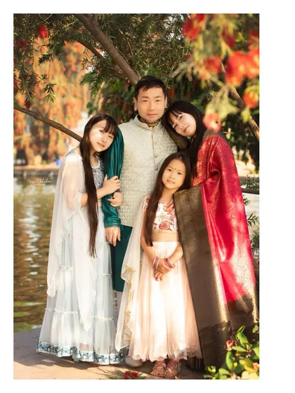 Family stories are beautiful in every culture. It was an honor to capture this family, who embraced Indian traditions with so much love, during a sun-kissed outdoor portrait session in Delhi.