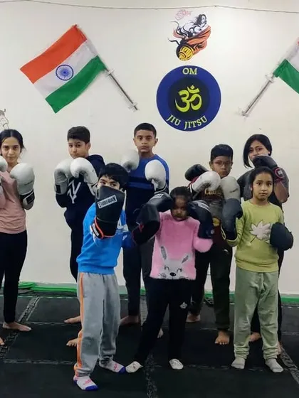 Our classes are for everyone. Here, kids and adults train side by side, learning boxing and Muay Thai in a fun and supportive group setting.