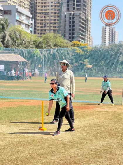 A female player focuses on her bowling run up during a competitive match in the PPL.