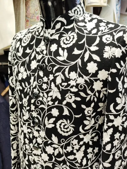 A gallery of our Jodhpuri and Indo-Western designs, showing the variety of fabrics, embroidery styles, and custom fits available for your special occasion.