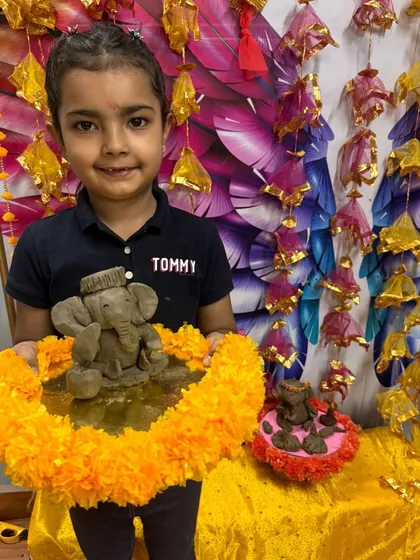 Two Ganeshas are better than one! This student made a large idol and a small one for his festive setup.