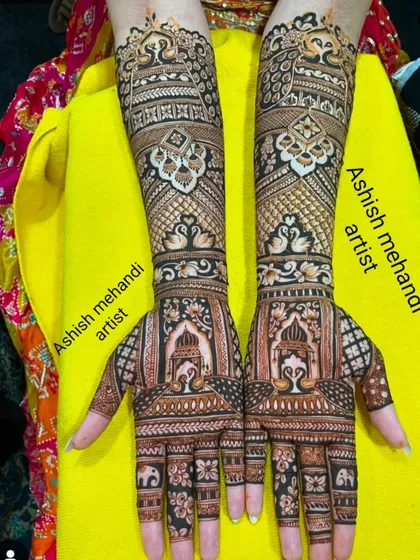 An elegant design featuring floral and architectural motifs, with delicate elephant figures on the fingers.
