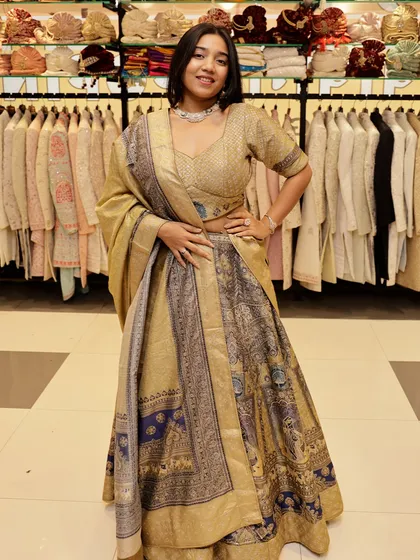 A confident pose in this unique printed lehenga, perfect for a wedding guest who wants to stand out.