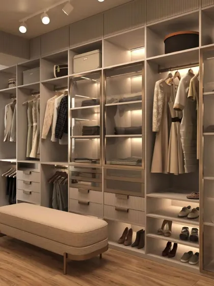 An expansive walk-in wardrobe designed for ultimate organization and elegance. This closet features custom sections for hanging clothes, glass-front drawers for accessories, dedicated shoe shelves, and integrated LED lighting throughout to illuminate your collection.