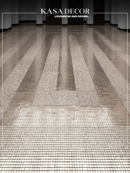 Platinum mosaics installed under a skylight at the Seema Gujral flagship store. The tiles create a delicate, concentric rhythm, playing with reflection and light to evoke a powerful emotion.