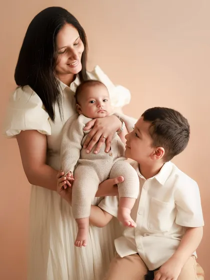 A beautiful portrait of a mother with her two sons. I love creating these images that celebrate motherhood and the special bond she shares with each of her children.