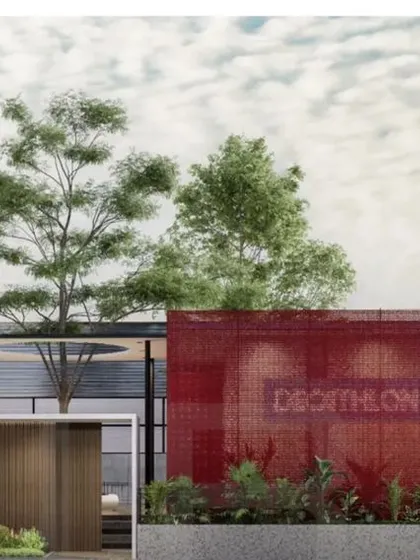 This render showcases the Business Hub in Tiruppur, wrapped in a distinctive red metal shell. The design for this international brand's trade center is built on sustainability, utilizing composite panels made from 1,55,000 recycled PET bottles.