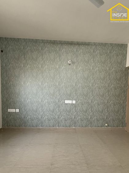 A simple textured wallpaper can completely transform a room. We used this subtle, patterned wallpaper on an accent wall to add depth and character to one of the bedrooms.