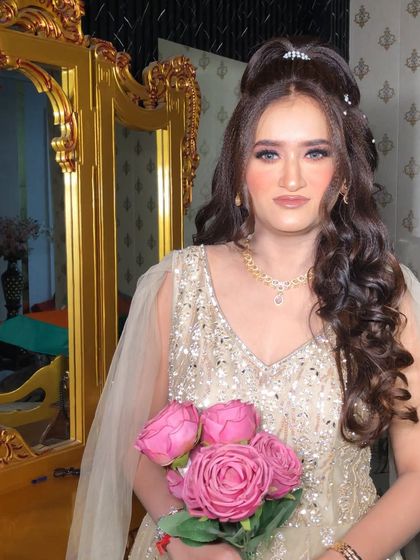 The complete look for this engagement ceremony. The makeup is designed to be both beautiful and long-lasting.