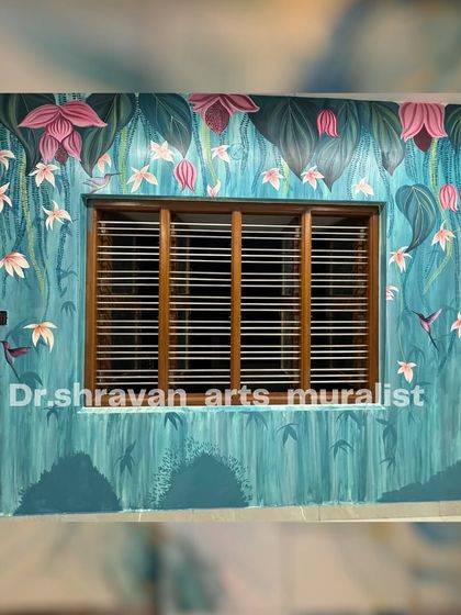 A whimsical take on a tropical theme, this mural features a textured turquoise background with hanging flowers and hummingbirds, creating a vibrant and ornamental look.