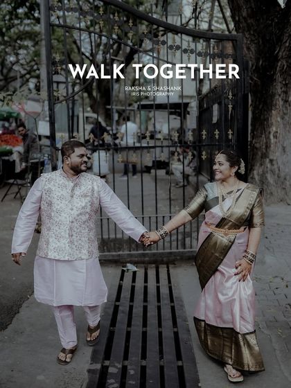 Walking together into your future. This candid shot from an engagement session captures the couple in a natural, happy moment.