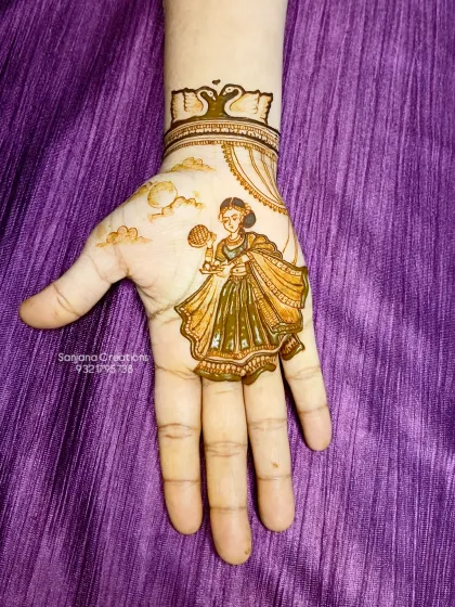 A clean, initial application of the Karwachauth figure. This shows the outline before the intricate filling and shading work begins.