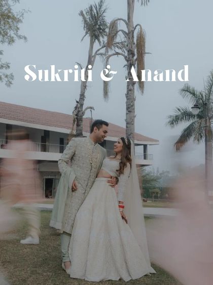 A title card image for "Sukriti & Anand," using the creative motion blur shot as a romantic background.