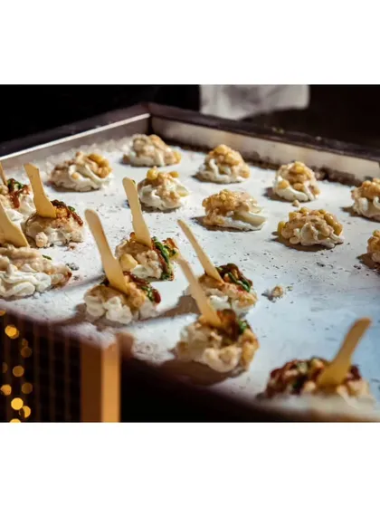 A tray of my Molecular Dahi Wada being prepared. The modern technique creates a unique, melt-in-your-mouth experience for a beloved traditional dish.