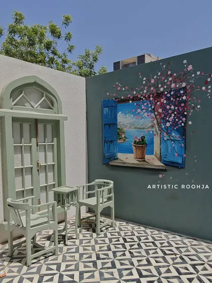 I designed this 3D window mural for a cafe in Ahmedabad to create an immersive, photo-ready corner for customers. The European-inspired scene with blooming flowers provides a beautiful illusion, making the space feel larger and more inviting.