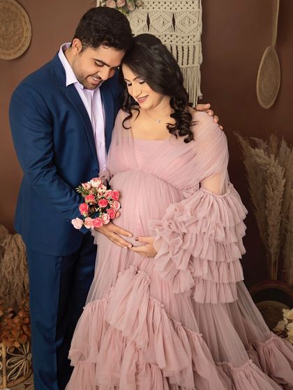 So much love and anticipation in one photo. This couple's portrait in our boho setup showcases the gentle connection between them as they await their baby boy.