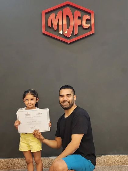 Another proud student receiving her certificate. We celebrate every achievement.